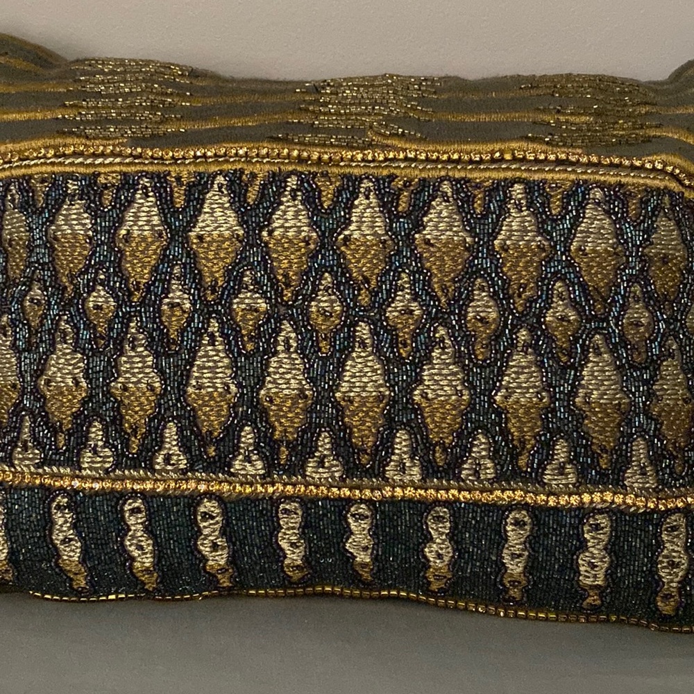 Bejeweled accent pillow with blues, golds and silvers